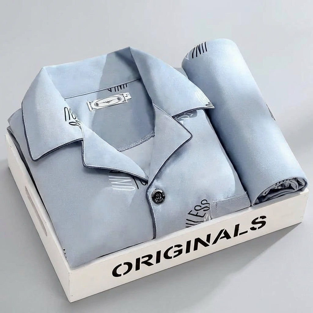 Klassieke heren pyjamaset met modern comfort. Overhemd met knoopsluiting en lange broek voor ontspanning.