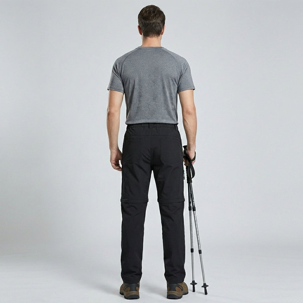 Legergroene heren outdoor afritsbroek, ideaal voor wandelen; snel om te zetten in shorts.