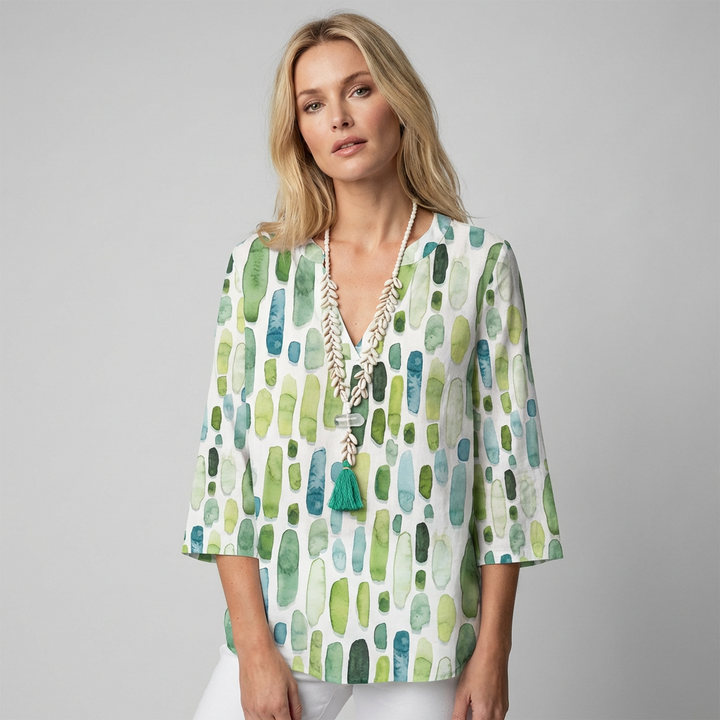 Chique dames geometrische blouse met V-hals en 3/4 mouwen, ideaal voor lente/zomer. Comfortabel, veelzijdig.