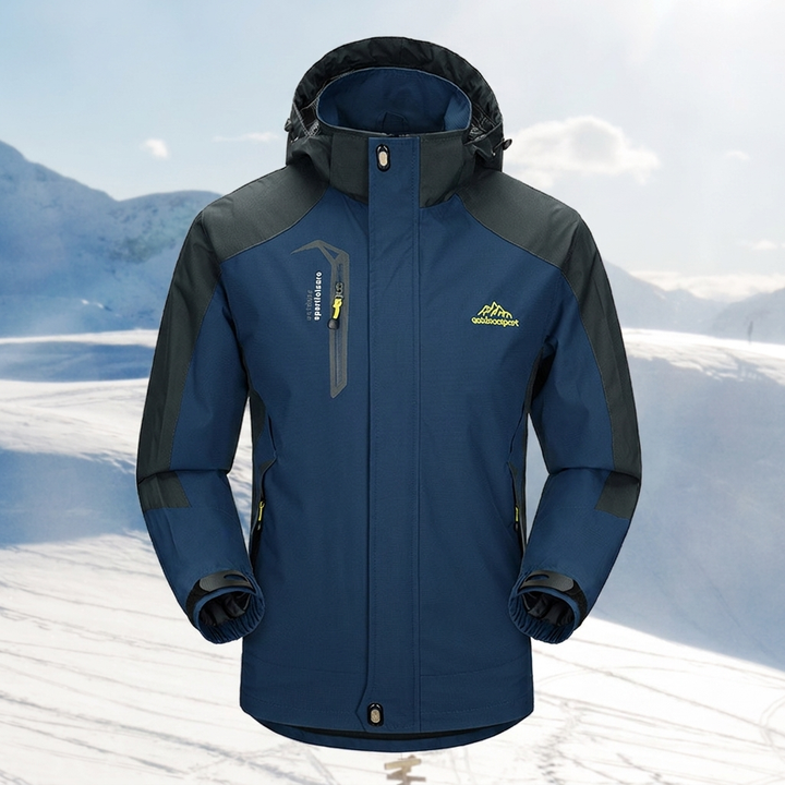 Detailopname van de ademende en waterdichte stof van deze duurzame dames outdoorjas.