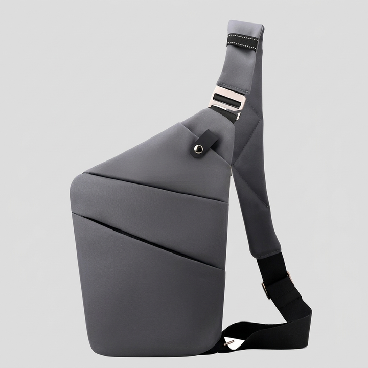Slanke anti-diefstal schoudertas, perfect voor een minimalistische look. Compact en veilig voor dagelijks gebruik.