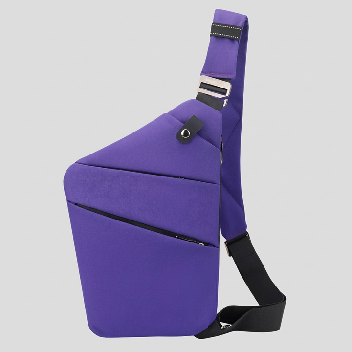 Vooraanzicht van de compacte anti-diefstal crossbodytas in stijlvolle neutrale kleur, ideaal voor unisex gebruik.