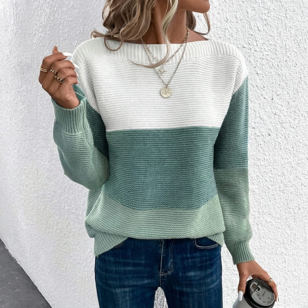 Trendy en comfortabele dames trui met uniek patchwork design, ideaal voor een casual chic look.