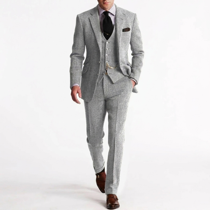 Close-up detail van de nylon stof en knopen van de heren businessset, inclusief blazer, vest en broek.