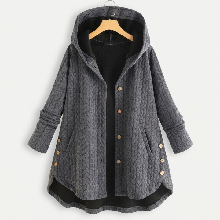 Close-up van de stijlvolle knopen op een tijdloze dames katoenen jas. Accentueert de elegante en duurzame afwerking.