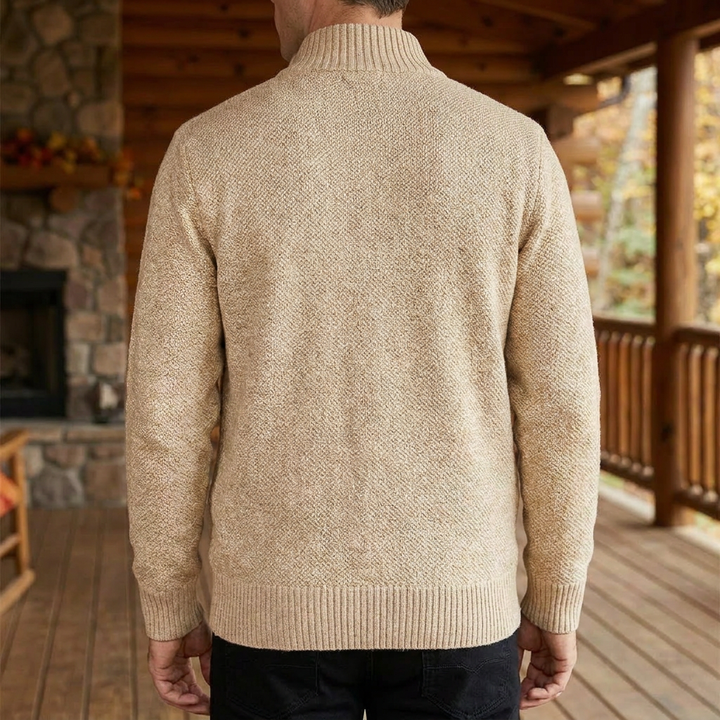 Comfortabel beige gebreid herenvest, ideaal voor een warme en veelzijdige herenmode outfit.