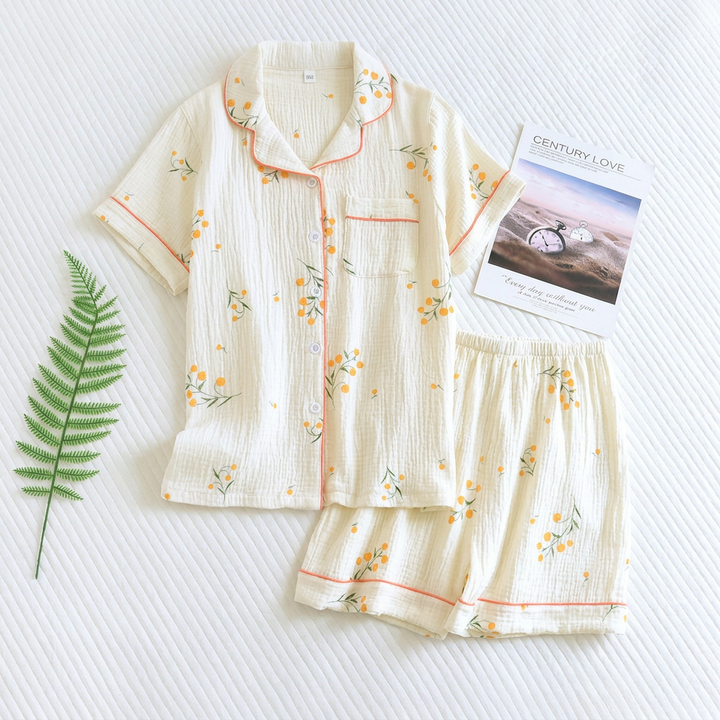 Dames pyjamaset van ademend katoen, bloemenprint, ideaal voor een elegante en comfortabele nachtkleding ervaring.