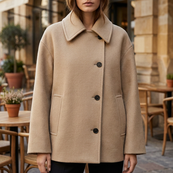 Trendy oversized khaki wollen damesjas, warm en stijlvol. Perfect voor herfst en winter.