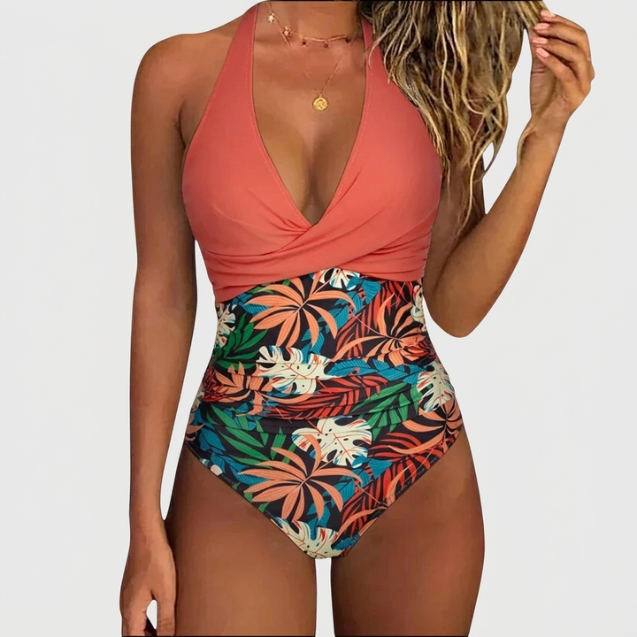 Stijlvol dames halter badpak, voorzien van een prachtige bloemenprint. Comfortabele zwemkleding voor de modebewuste vrouw.