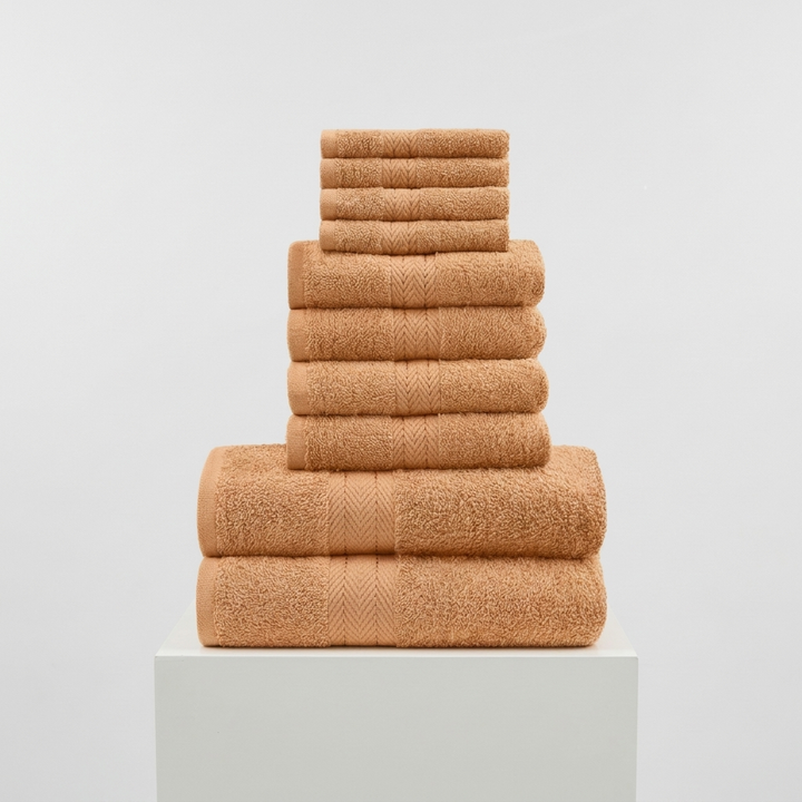 Overzicht van de complete 10-delige badkamerset: handdoeken, washandjes, badtextiel.