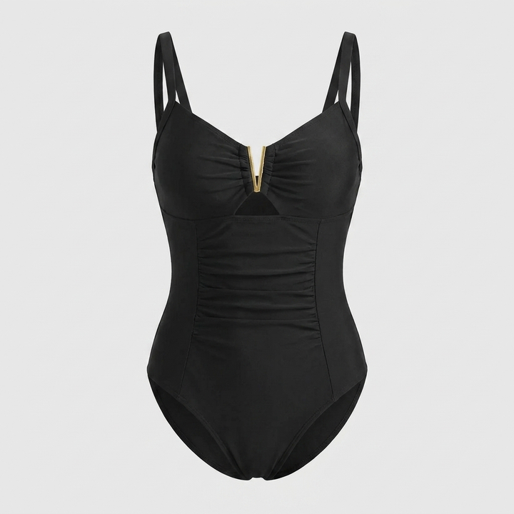 Stijlvol dames badpak voor zwembad of strand, met chique gouden accenten en een elegante pasvorm.