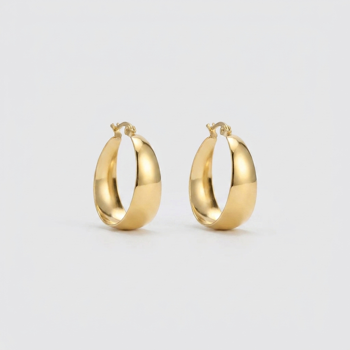 Platte zilverkleurige hoepel oorbellen van 25 mm voor dames, elegante en comfortabele sieraden voor elke outfit.