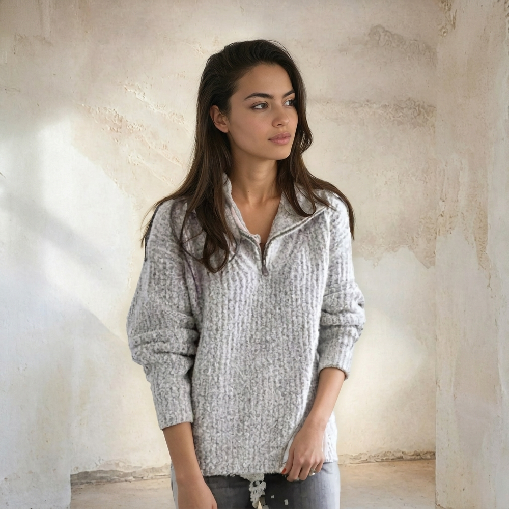 Model draagt een elegante dames half-zip pullover, perfect voor een casual of stijlvolle look.