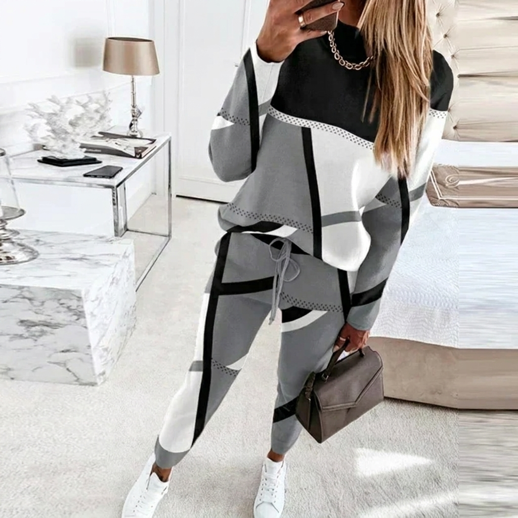 Dames casual tweedelige set met comfortabele O-hals top en lange broek van polyester, relaxed fit voor dagelijks gebruik.