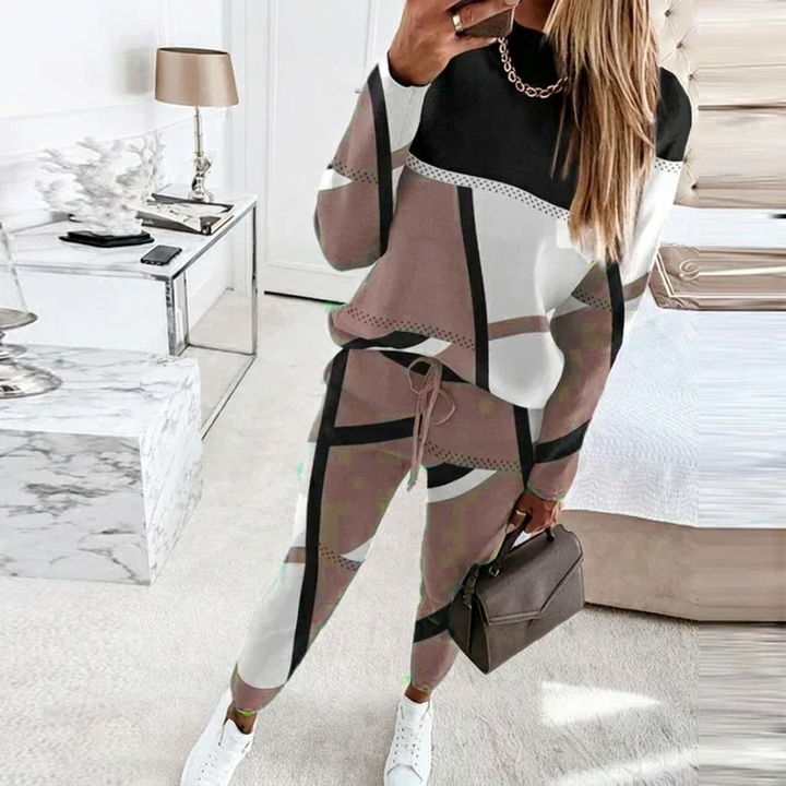 Stijlvolle dames tweedelige set: polyester O-hals top en lange damesbroek. Perfect voor comfortabele, casual dagelijkse outfits.