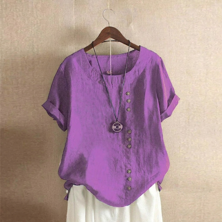 Damesmode: comfortabele top met korte mouwen en knoopdetails. Stijlvol en gemakkelijk te combineren voor lente & zomer.