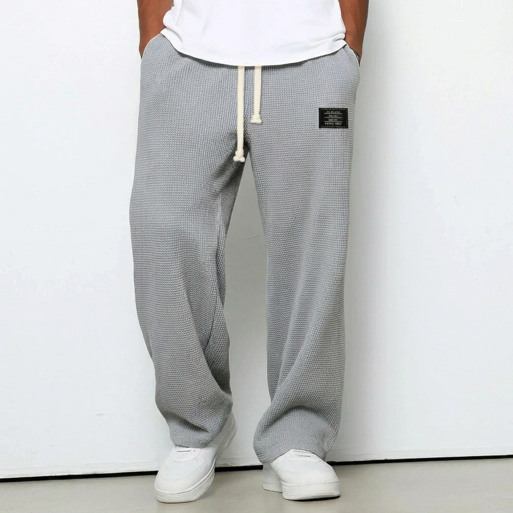 Casual herenbroek met losse pasvorm, grijs, perfect voor dagelijks gebruik en sportieve activiteiten.