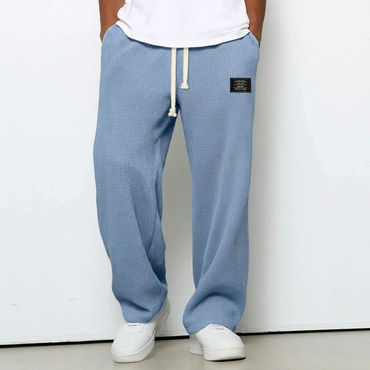 Heren sportieve broek, lichtgrijs, zachte stof, perfect voor thuis, sport of een casual look.