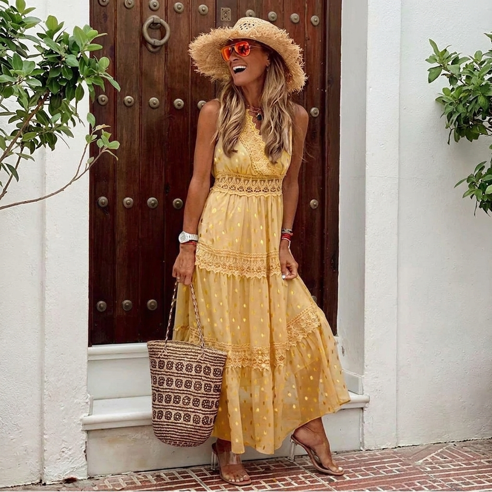 Stijlvolle dames midi zomerjurk, bohemien stijl met verfijnd haakwerk en comfortabele pasvorm.