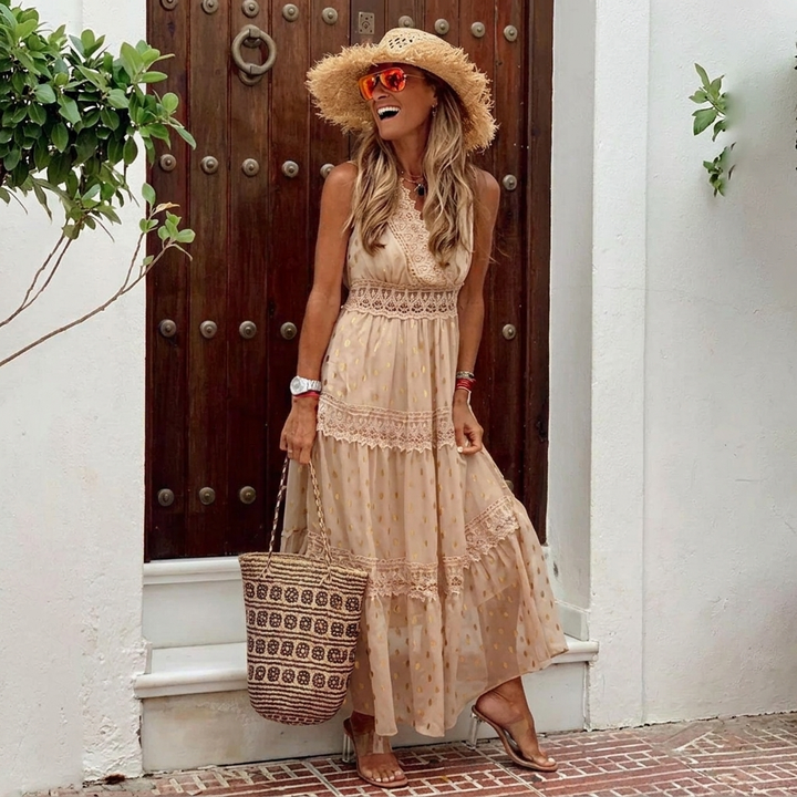 Comfortabele midi strandjurk voor dames, bohemien look met gedetailleerd haakwerk en luchtige stof.