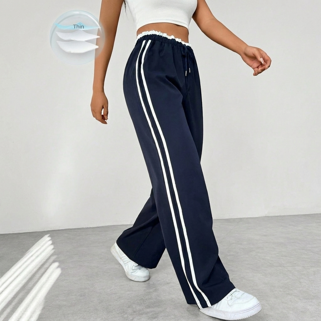 Dames comfortabele sportbroek met wijde pijpen en stijlvolle strepen, perfect voor casual streetwear.