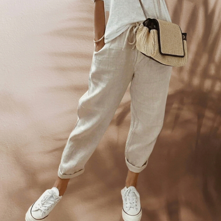 Stijlvolle dames linnenlook zomerbroek, comfortabel met wijde pijpen en hoge taille voor zomerse dagen.