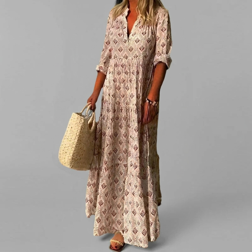 Elegante dames maxi-jurk met vloeiende vintage print. Comfortabele katoenmix, ideaal voor zomerse chic.