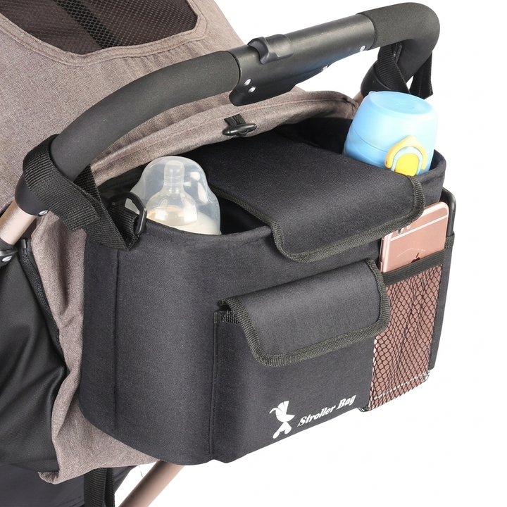 Multifunctionele kinderwagen opbergtas met veel vakken voor babyflesjes en persoonlijke spullen. Essentieel voor ouders.