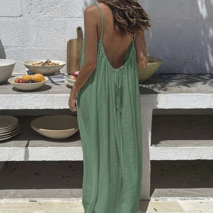 Ontspannen damesjurk met open rug, perfect als casual huisjurk of zomerse loungewear.