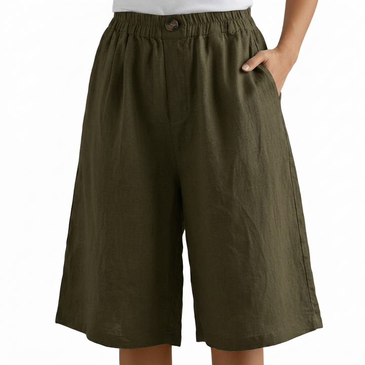 Dames shorts met hoge taille en losse pasvorm, gemaakt van comfortabel katoen-linnen voor de zomer.