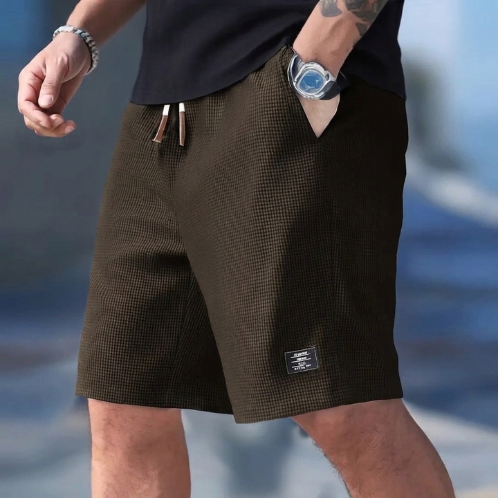 Stijlvolle heren sportshorts, veelzijdige vrijetijdskleding voor actieve zomers en ontspanning.