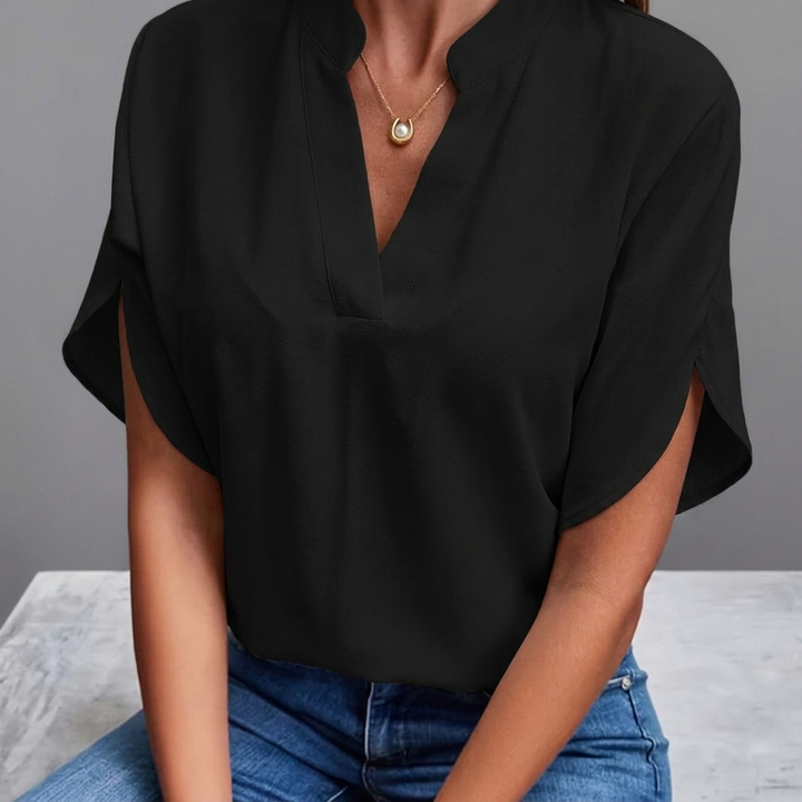 Modieuze effen damesblouse met V-hals en korte mouwen, een veelzijdige casual top voor elke gelegenheid.