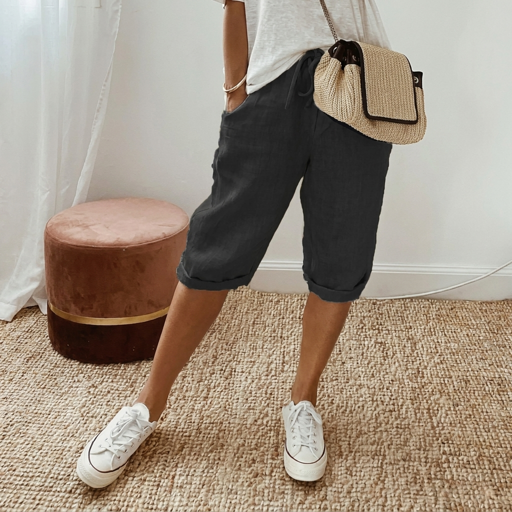 Comfortabele cropped damesbroek, losse pasvorm, elastische taille. Perfecte zomerbroek voor casual en travel.