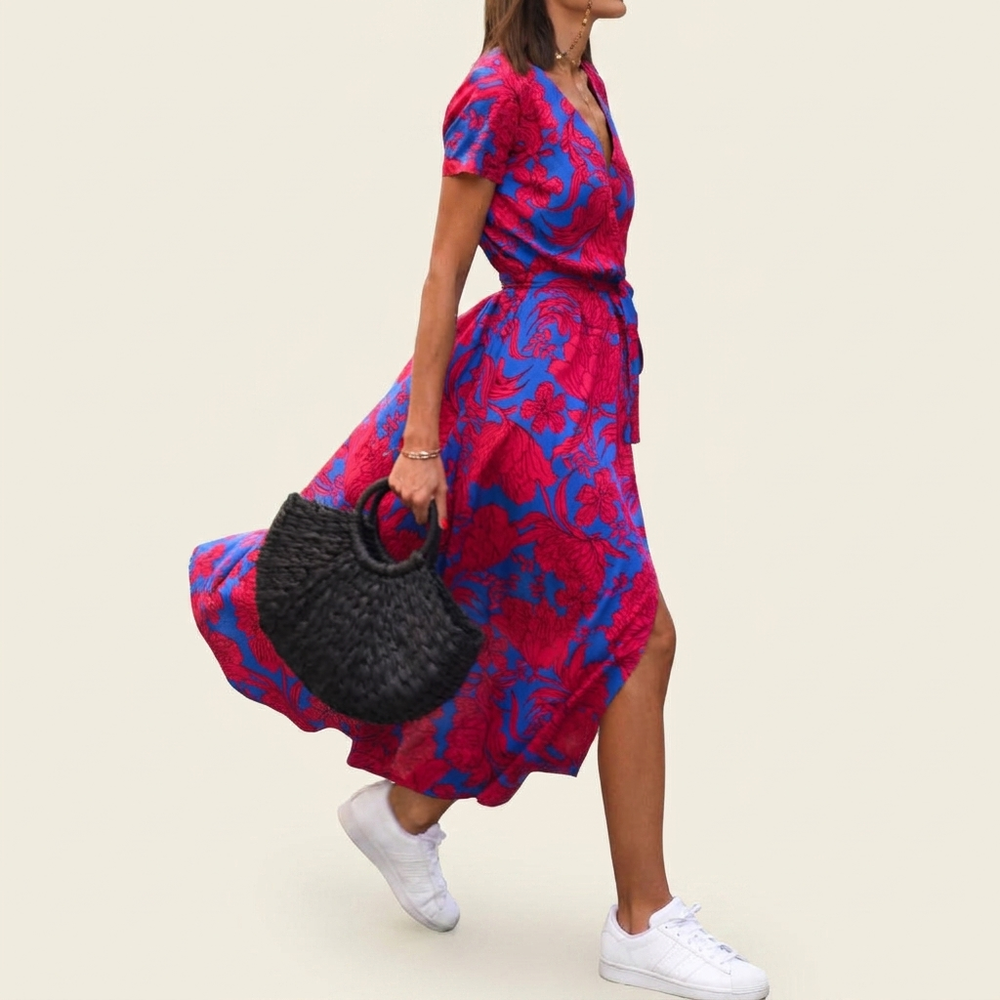 Modieuze blauwe dames strandjurk (CJ26) met trendy print, ideaal voor een casual zomerlook en strandmode.