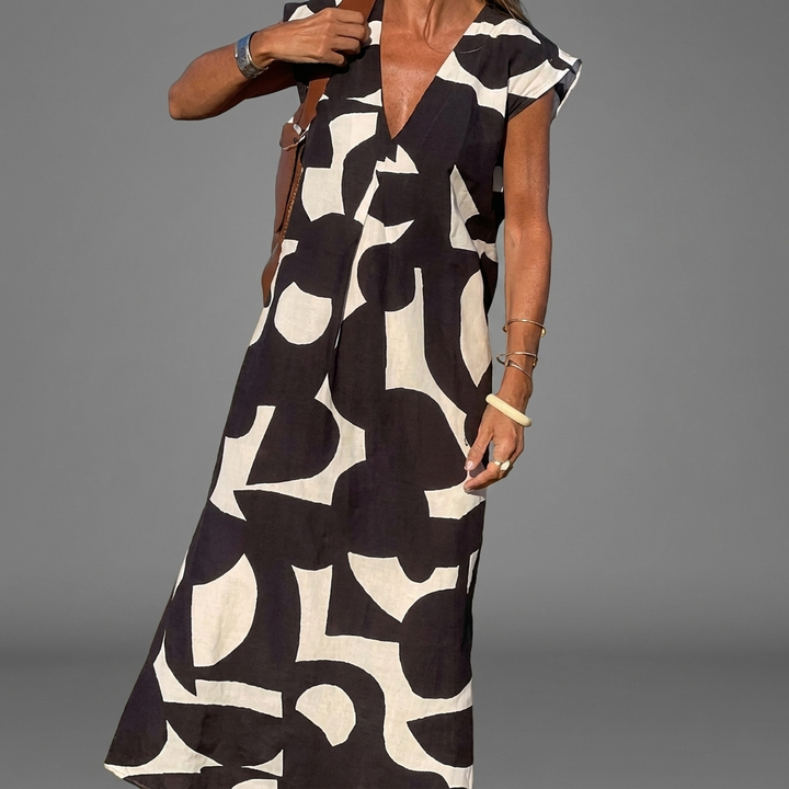 Elegante Skinzline dames V-hals jurk met losse taille voor ultiem comfort. Ideaal als casual of zomerjurk.