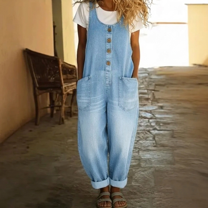 Marineblauwe denim jumpsuit voor dames met verstelbaar trekkoord in de taille, perfect voor een comfortabele vrijetijdslook.