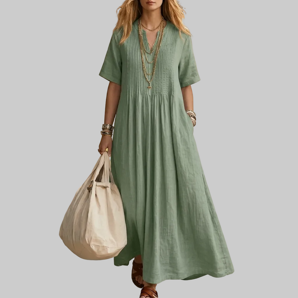 Casual dames plissé jurk met V-hals voor zomerse dagen. Lichtgewicht katoen-linnen blend, ideaal voor strand.