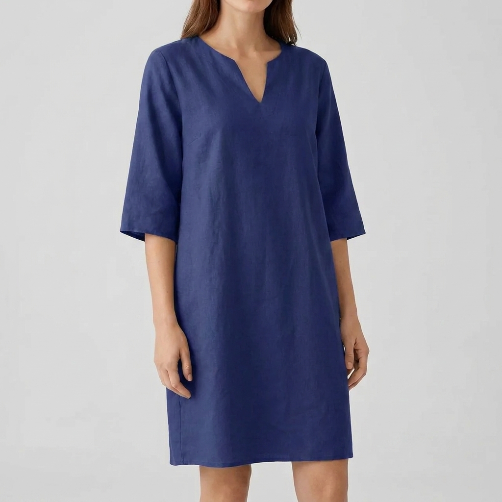 Tijdloze damesjurk in vintage stijl, met korte mouwen en een midi-lengte. Perfect voor een elegante retro look.