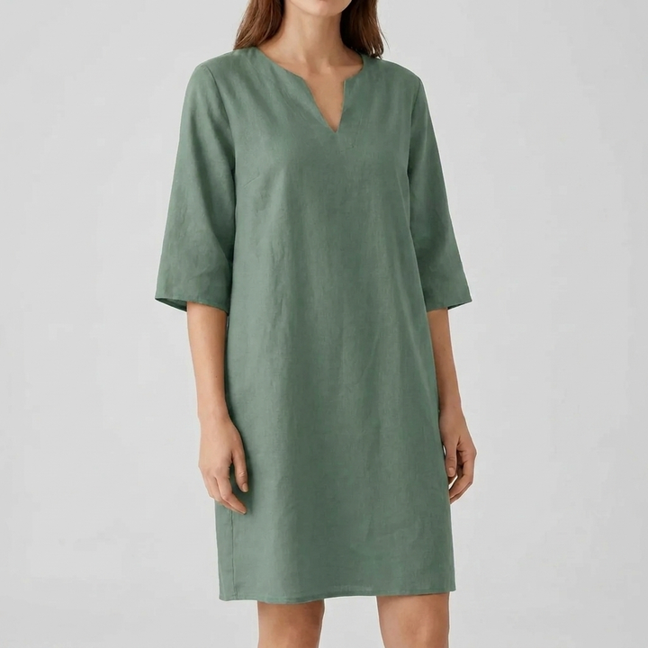 Retro damesjurk met korte mouwen en midi-lengte. Deze elegante A-lijn jurk is een perfecte aanvulling op elke garderobe.