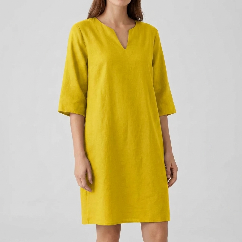 Comfortabele en stijlvolle vintage midi-jurk voor dames. Met korte mouwen en een elegante, tijdloze uitstraling.