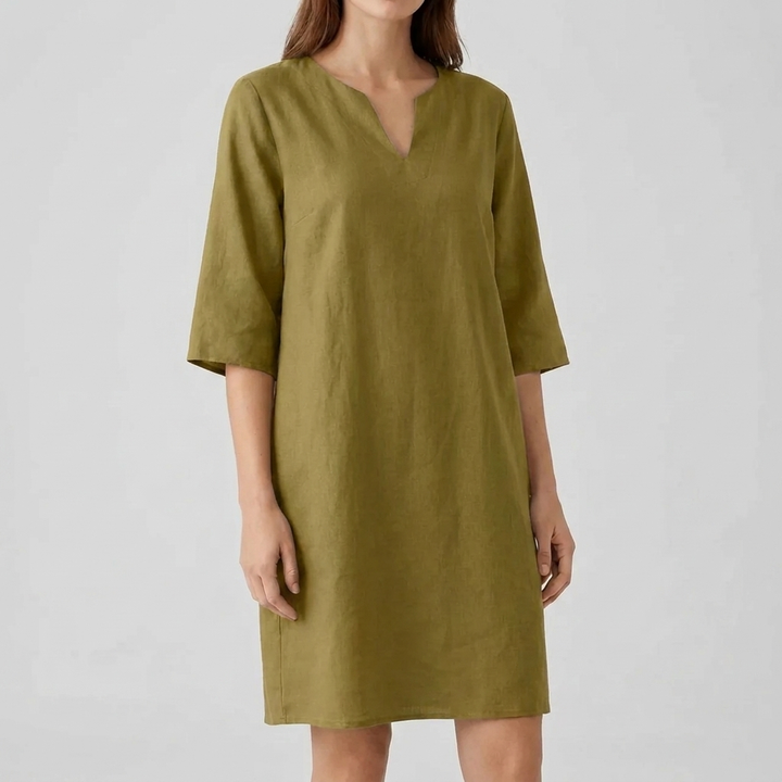 Vintage zomerjurk CJ26 met korte mouwen. Deze midi-jurk voor dames combineert retro mode met casual elegantie.