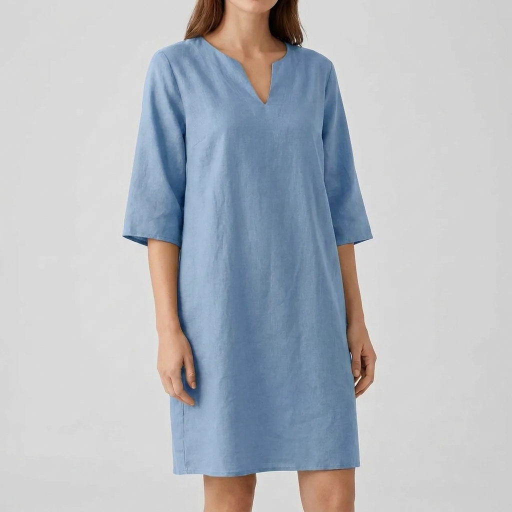 Modieuze retro midi-jurk met korte mouwen. Deze vintage damesjurk, type CJ26, biedt comfort en tijdloze elegantie.