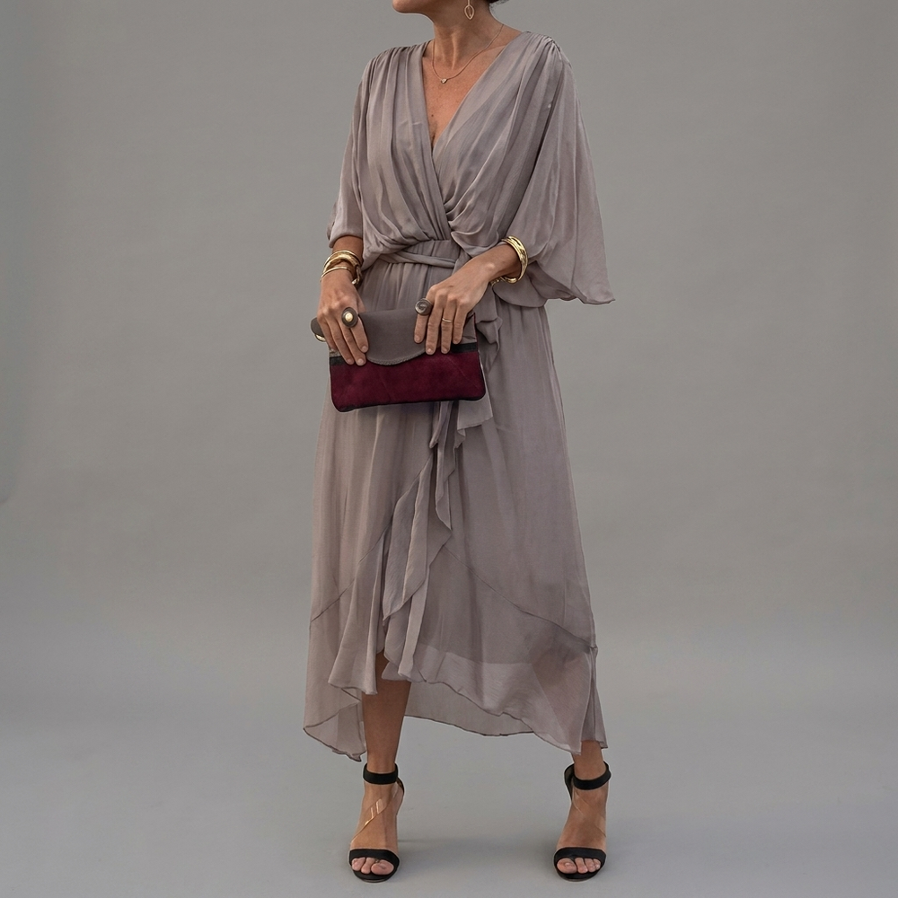 Comfortabele casual damesjurk met vleermuismouw, ideaal voor lente/zomer. Elegante asymmetrische pasvorm.