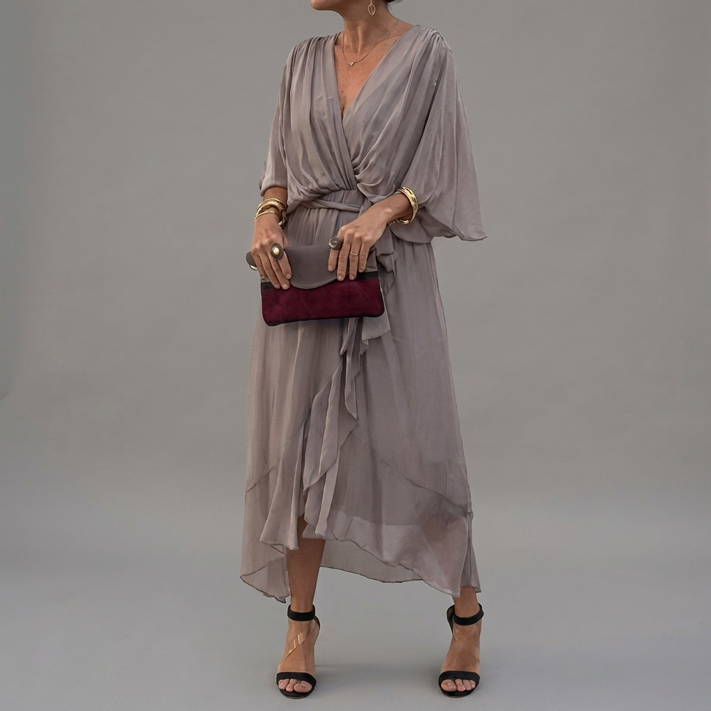 Comfortabele casual damesjurk met vleermuismouw, ideaal voor lente/zomer. Elegante asymmetrische pasvorm.