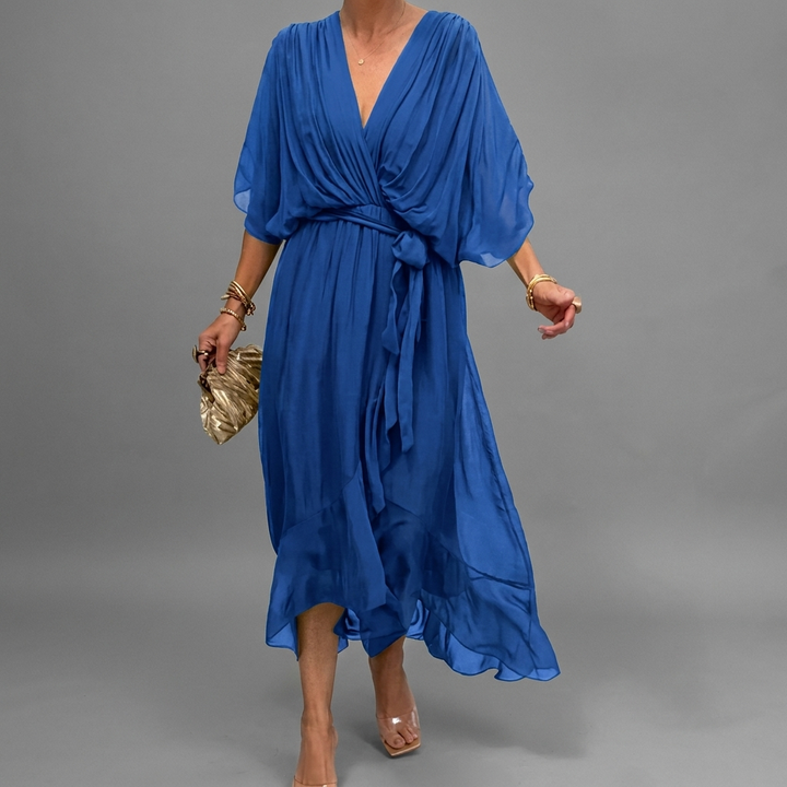 Trendy lente/zomer damesjurk met vleermuismouwen. Losse, comfortabele pasvorm voor een stijlvolle look.