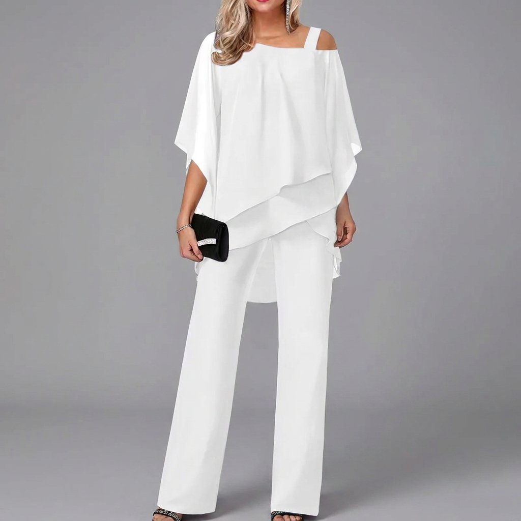 Elegante dames tweedelige set met comfortabele vleermuistop en bijpassende rechte broek, perfect voor casual chic.