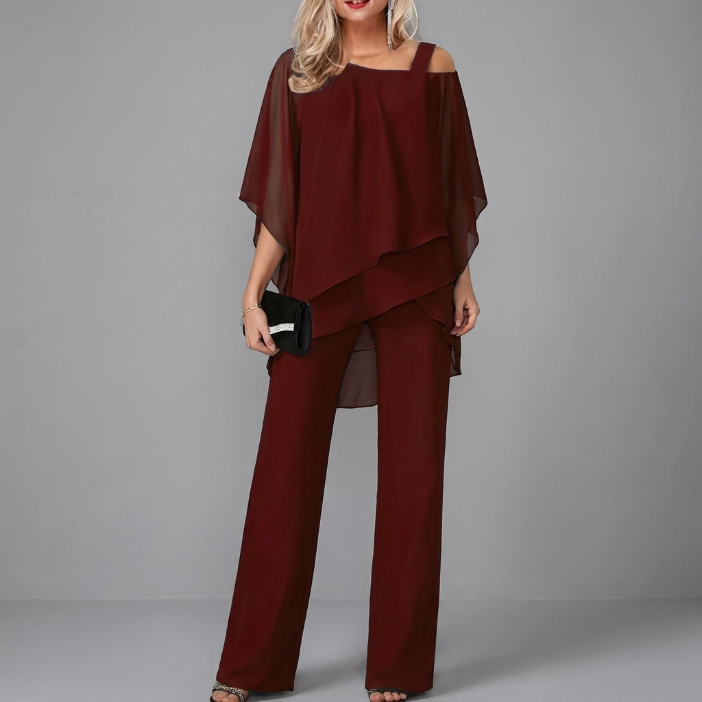 Modieuze dames tweedelige outfit: vleermuistop met rechte broek. Een elegante en comfortabele set voor diverse gelegenheden.