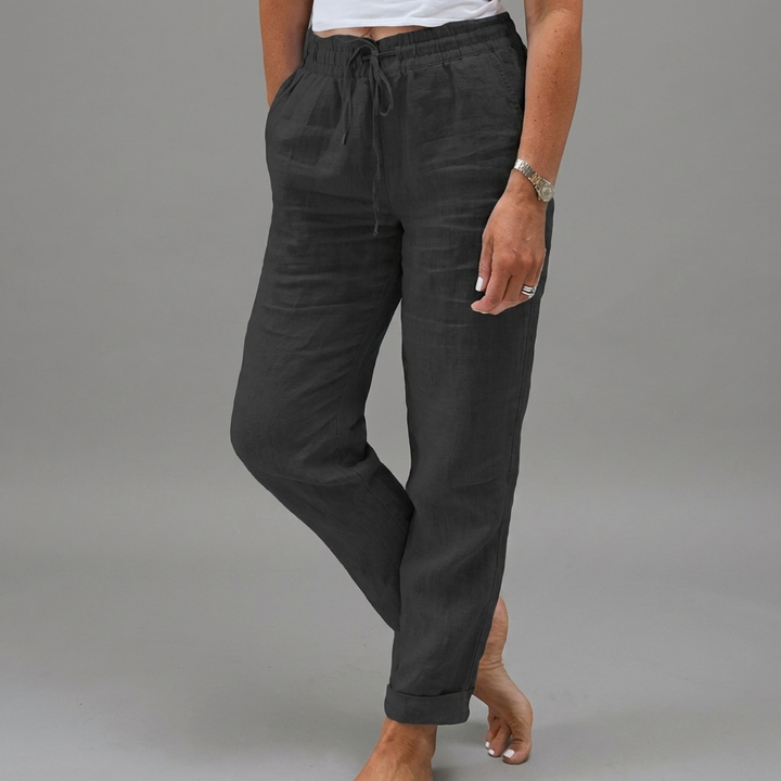 Stijlvolle effen dames zomerbroek met hoge taille en elastische band, perfect voor vakantie en mode.