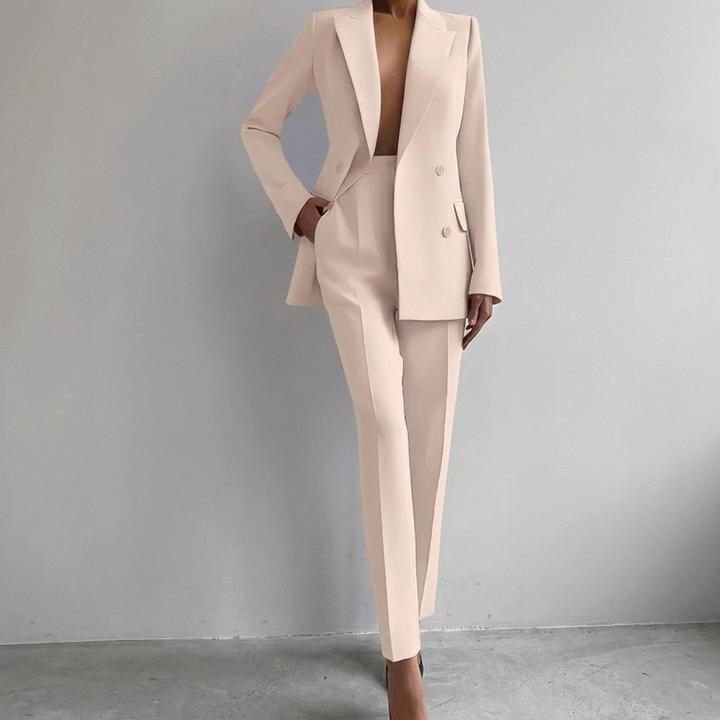 Elegante damespakset CJ26 met stijlvolle batwing top en comfortabele rechte broek, ideaal voor kantoor en vrije tijd.