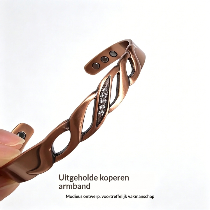 Verstelbare damesarmband van koper met oneindigheidssymbool, paarse zirkonia en handige magnetische sluiting.